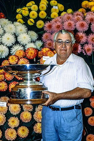 Philip Tivey holding the trophy for the best overall exhibit at Leicester Abbey Park show 1985
