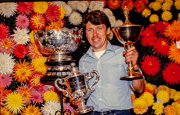 Chris with Best Dahlia, Best stand in marquee and best exhibit at whole show Southport 1970s